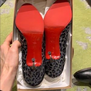 Christian Lounoutin cheetah metallic heels